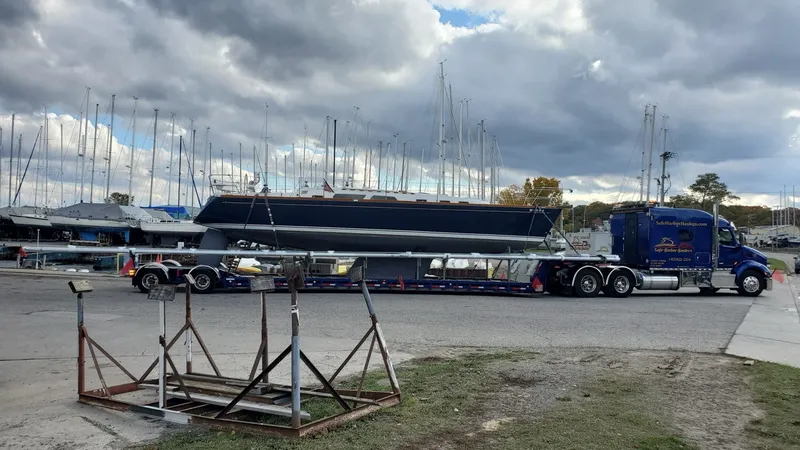 Boat transport of a Sabre 426 sailboat on a custom trailer at Torresen Marine in Muskegon, Michigan.